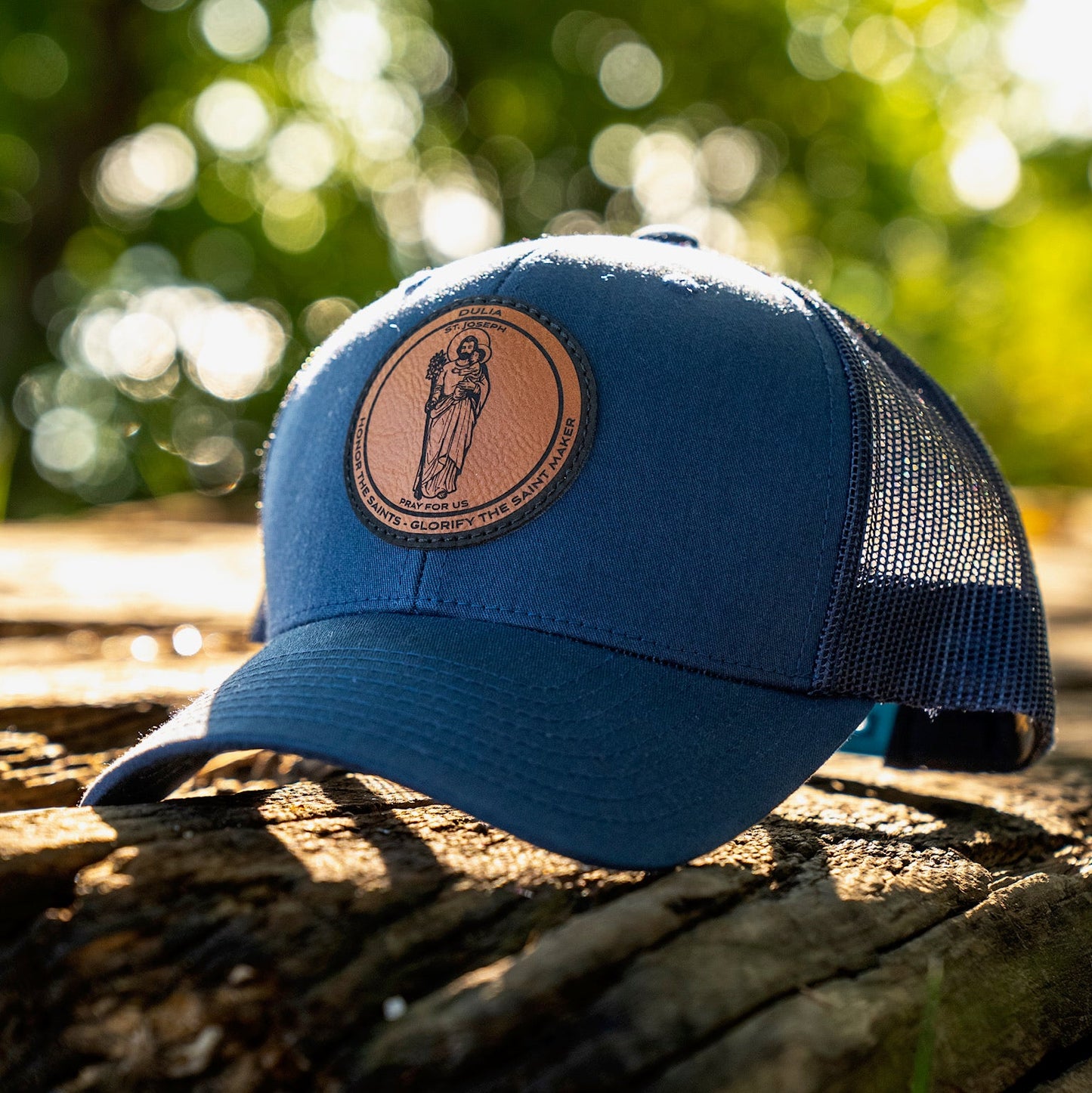 Leather patch trucker hat with St Joseph