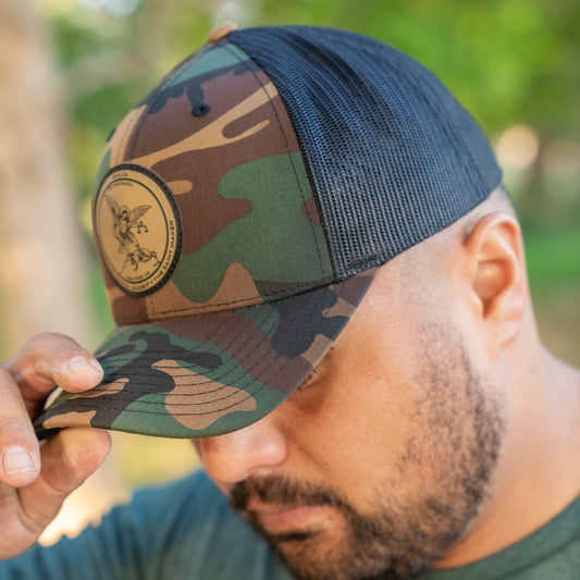 Leather patch trucker hat with St Michael