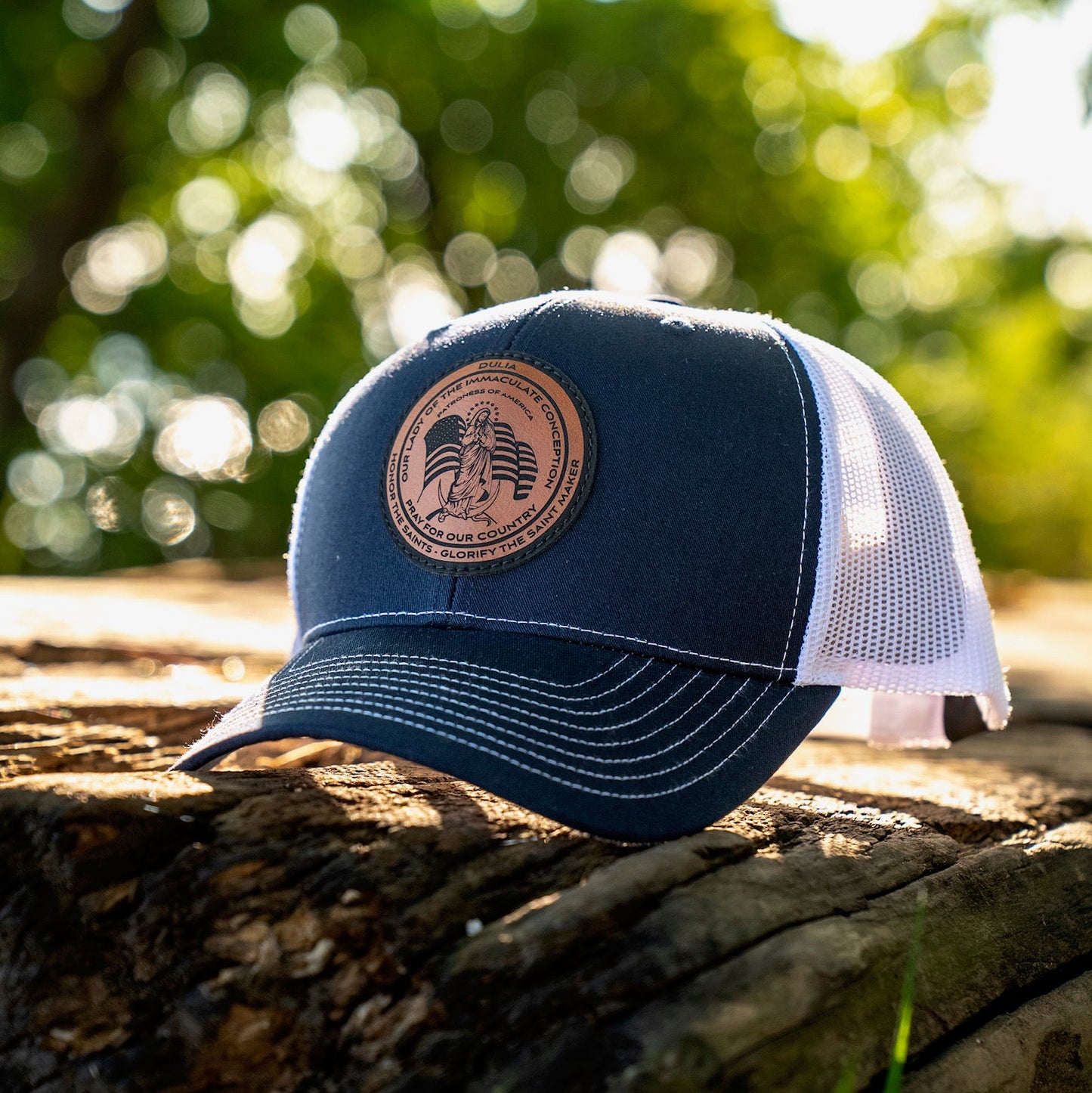 Leather patch trucker hat with Our Lady of the Immaculate Conception Patroness of America