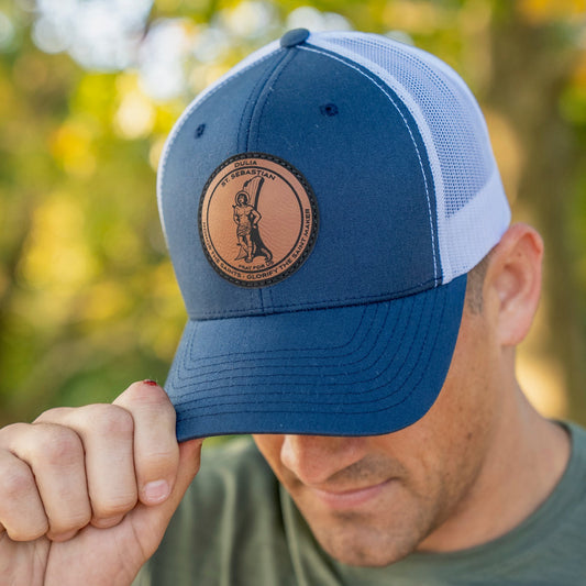 Leather patch trucker hat with St Sebastian