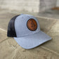 Leather patch trucker hat with St Benedict