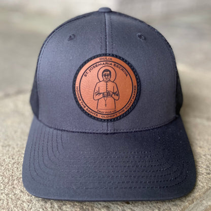 Leather patch trucker hat with St Josemaria Escriva