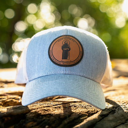 Leather patch trucker hat with St Padre Pio
