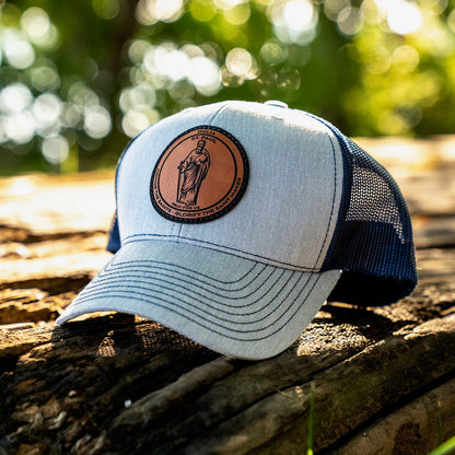 Leather patch trucker hat with St Paul